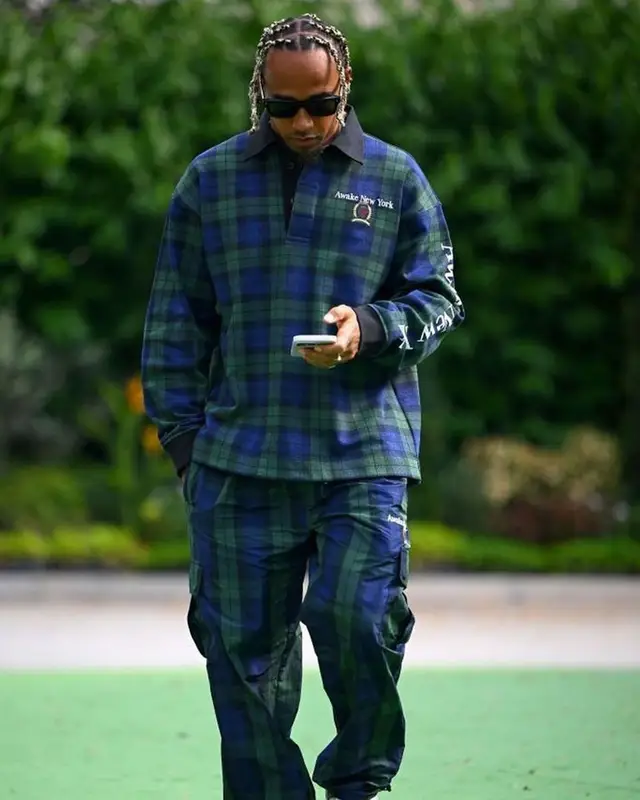 Lewis Hamilton outfit in Tommy Hilfiger, Jacques Marie Mage, and Awake NY, 2023