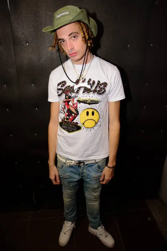 Dref Gold outfit in Balmain, Nike, and Supreme, 2023