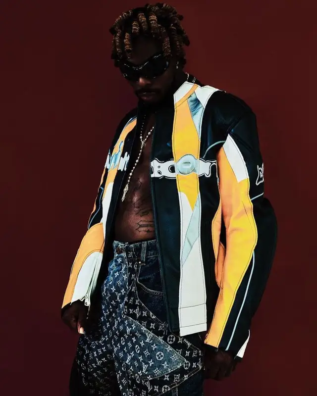 Asake outfit in Louis Vuitton and Balenciaga, 2023
