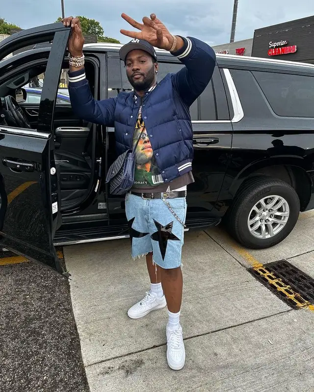 Peezy outfit in Moncler, Barriers, and Goyard, 2023