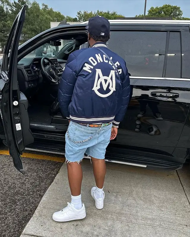 Peezy outfit in Moncler, Barriers, and Goyard, 2023