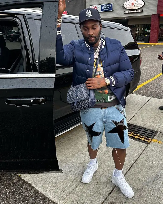 Peezy outfit in Moncler, Barriers, and Goyard, 2023