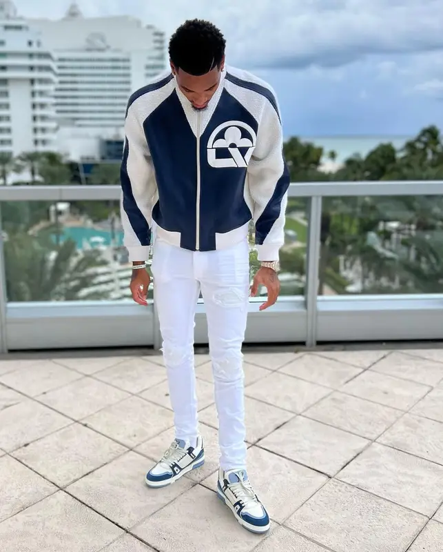 Dejounte Murray outfit in Louis Vuitton and Amiri, 2023