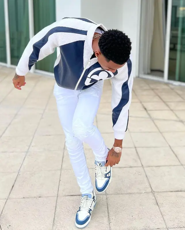 Dejounte Murray outfit in Louis Vuitton and Amiri, 2023