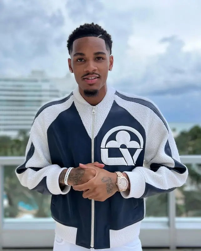 Dejounte Murray outfit in Louis Vuitton and Amiri, 2023
