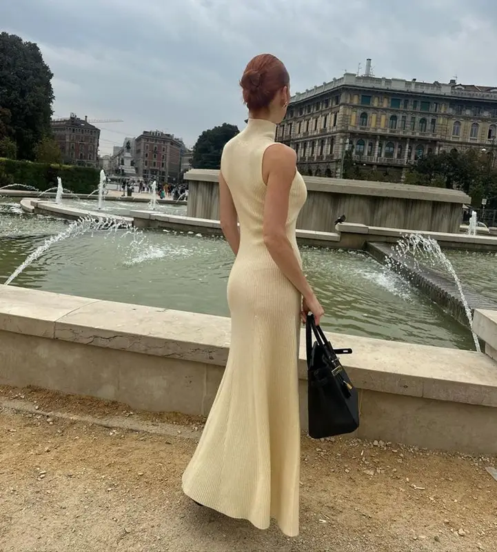 Meredith Duxbury outfit in The Row, Hermes, and Reformation, 2023