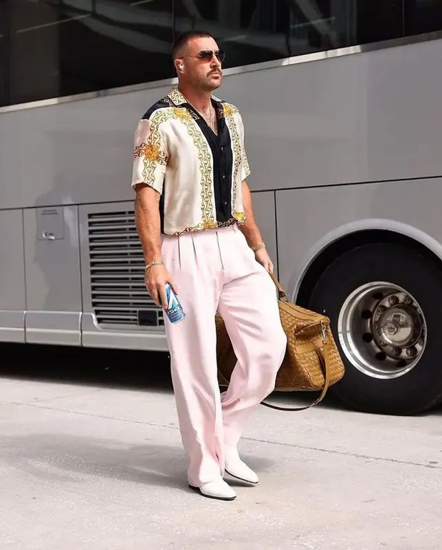Travis Kelce outfit in Amiri, Bottega Veneta, and Cartier, 2023