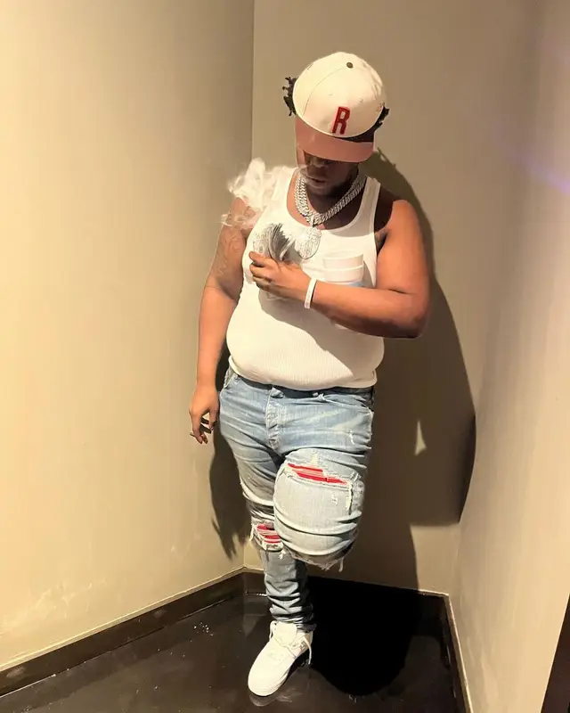 Big 30 outfit in Hanes, Amiri, and Nike, 2023