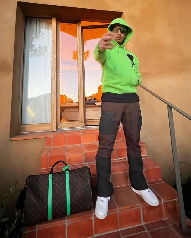 Oboy outfit in Ami Alexandre Mattiussi, Nike, and Louis Vuitton, 2023