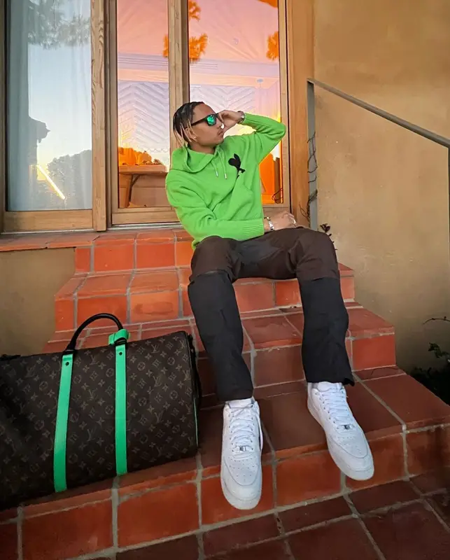 Oboy outfit in Ami Alexandre Mattiussi, Nike, and Louis Vuitton, 2023