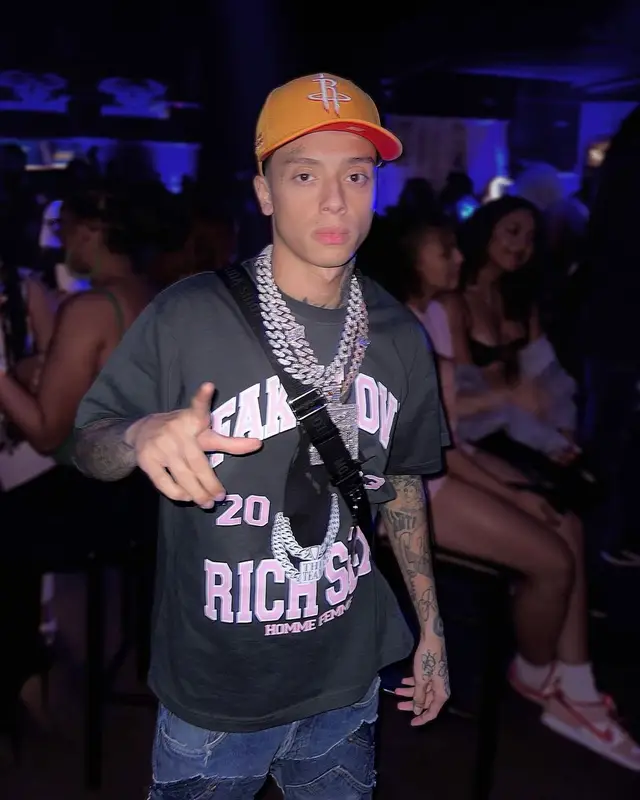 Central Cee outfit in Homme + Femme, Louis Vuitton, and Mitchell & Ness, 2023