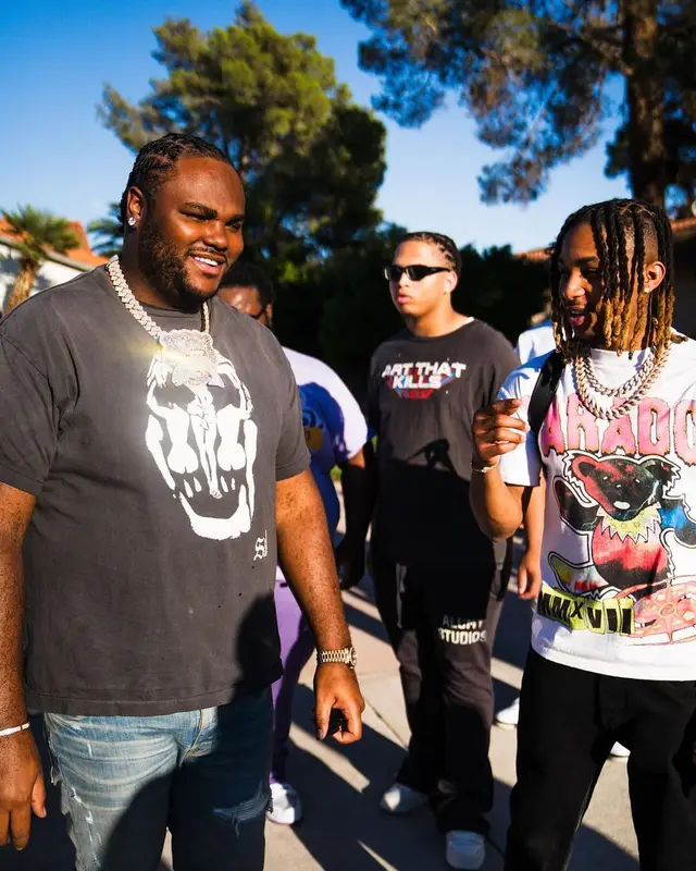 Tee Grizzley outfit in Saint Michael, Amiri, and Louis Vuitton, 2023