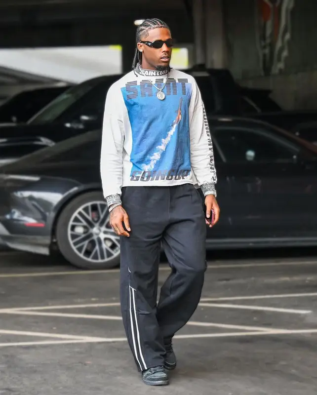 Tee Higgins outfit in Martine Rose, Jordan, and Prada, 2023