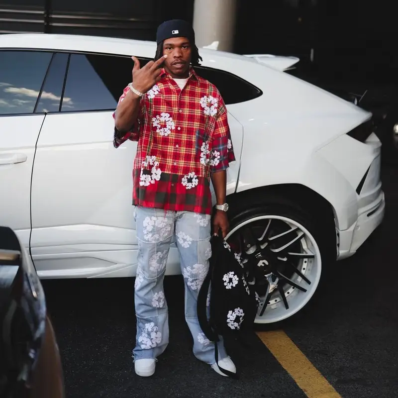 Lil Baby outfit in Readymade, Nike, and Denim Tears, 2023