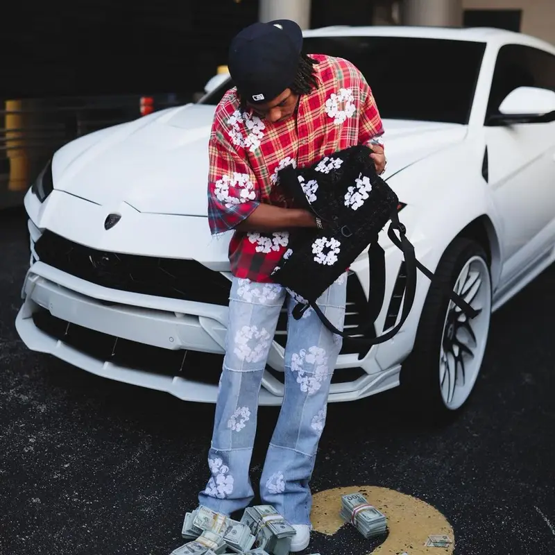 Lil Baby outfit in Readymade, Nike, and Denim Tears, 2023