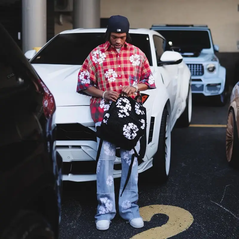 Lil Baby outfit in Readymade, Nike, and Denim Tears, 2023