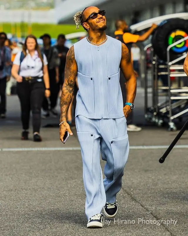 Lewis Hamilton outfit in Issey Miyake, Dior, and Nanushka, 2023