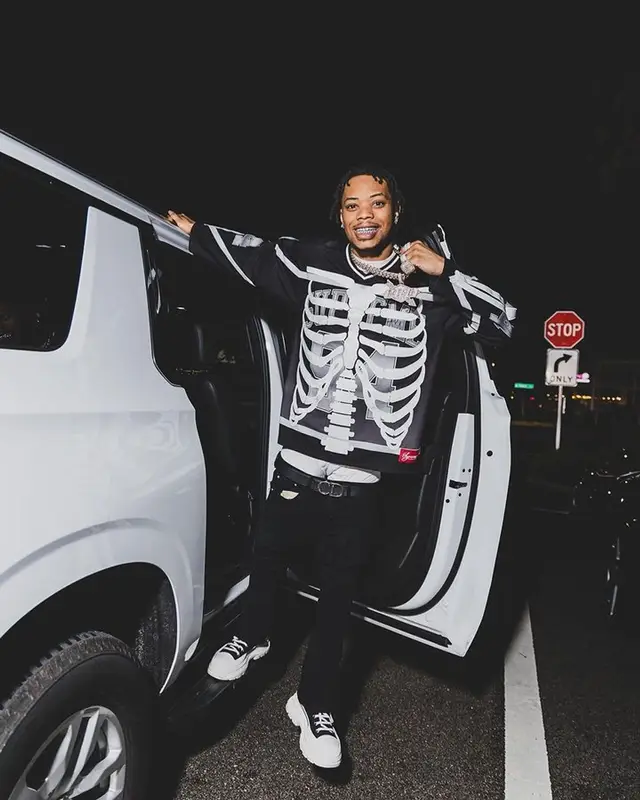 Lil Migo outfit in Supreme, Alexander McQueen, and Dior, 2023