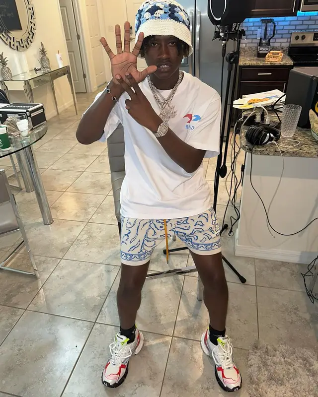 Baby Jungle outfit in Rhude and Balenciaga, 2023