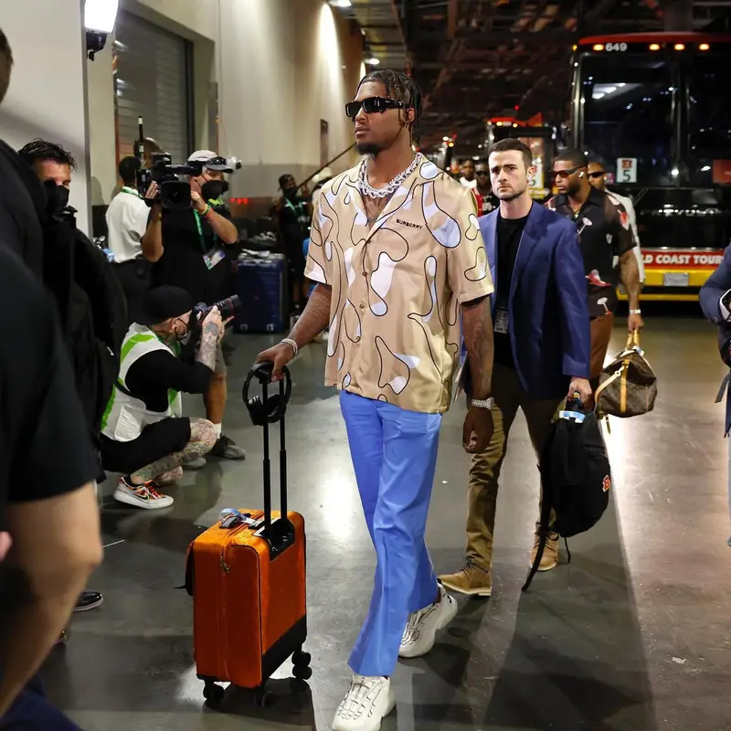 Tee Higgins outfit in Burberry, Amiri, and Prada, 2023