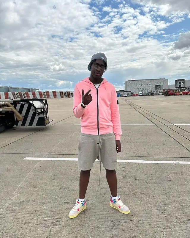 J1mulla outfit in Stone Island, Fear of God, and Ray-Ban, 2023