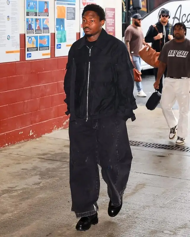 Stefon Diggs outfit in Dries Van Noten, Maison Margiela, and Alexander McQueen, 2023