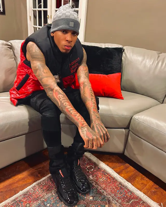 NLE Choppa outfit in Guapi, Prada, and Louis Vuitton, 2023