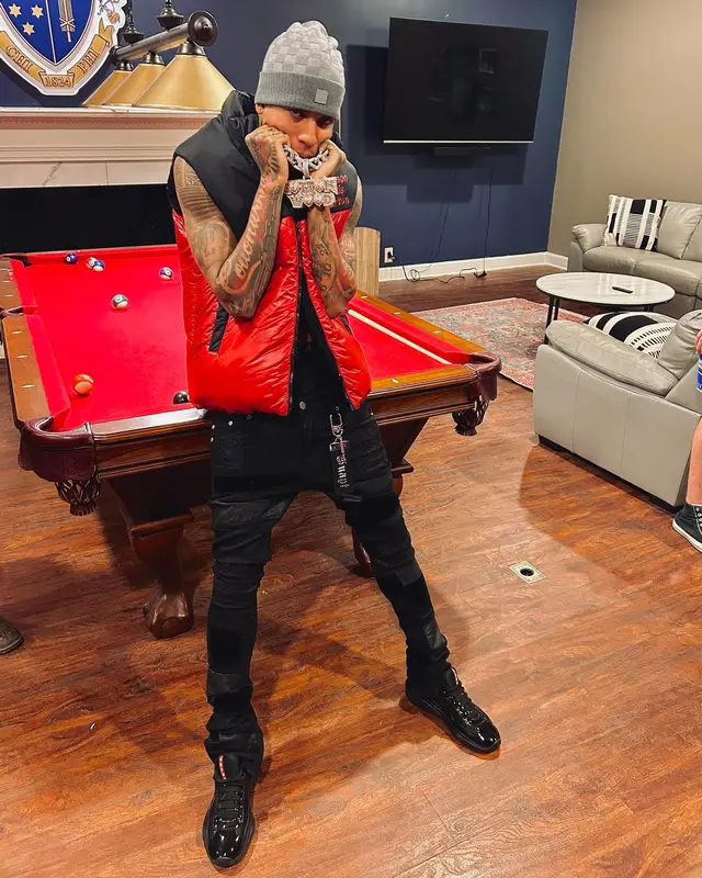 NLE Choppa outfit in Guapi, Prada, and Louis Vuitton, 2023
