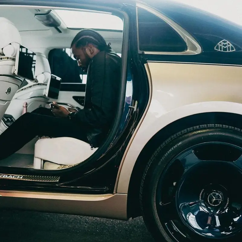 Meek Mill outfit in Louis Vuitton and Amiri, 2023