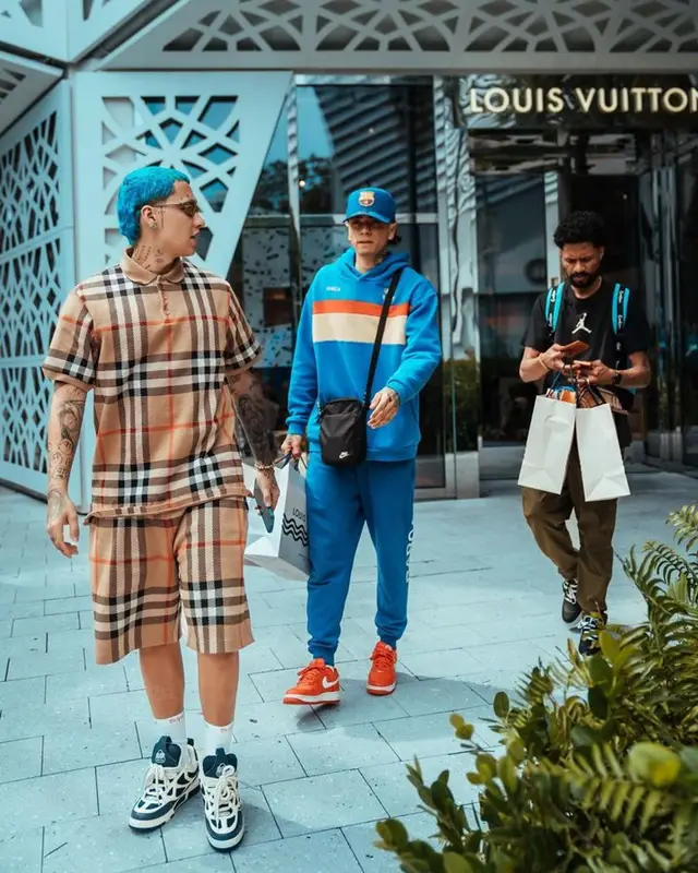 Blessd outfit in Burberry, Oakley, and Supreme, 2023