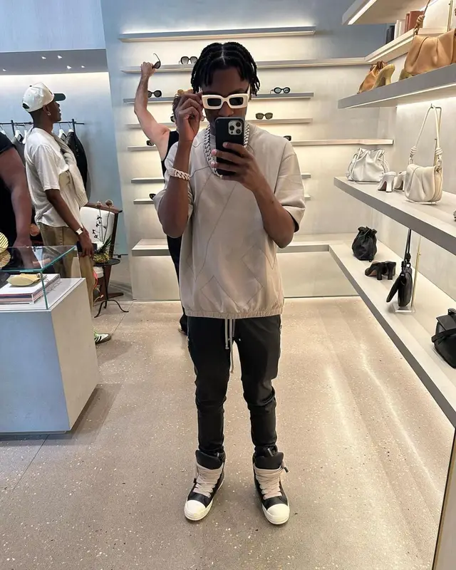 Lil Tjay outfit in Emporio Armani and Rick Owens, 2023