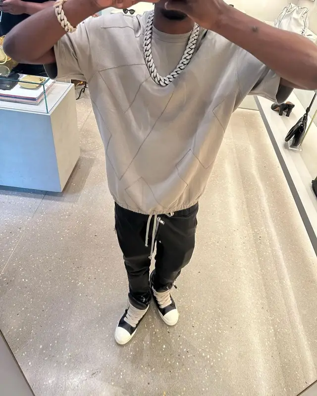 Lil Tjay outfit in Emporio Armani and Rick Owens, 2023