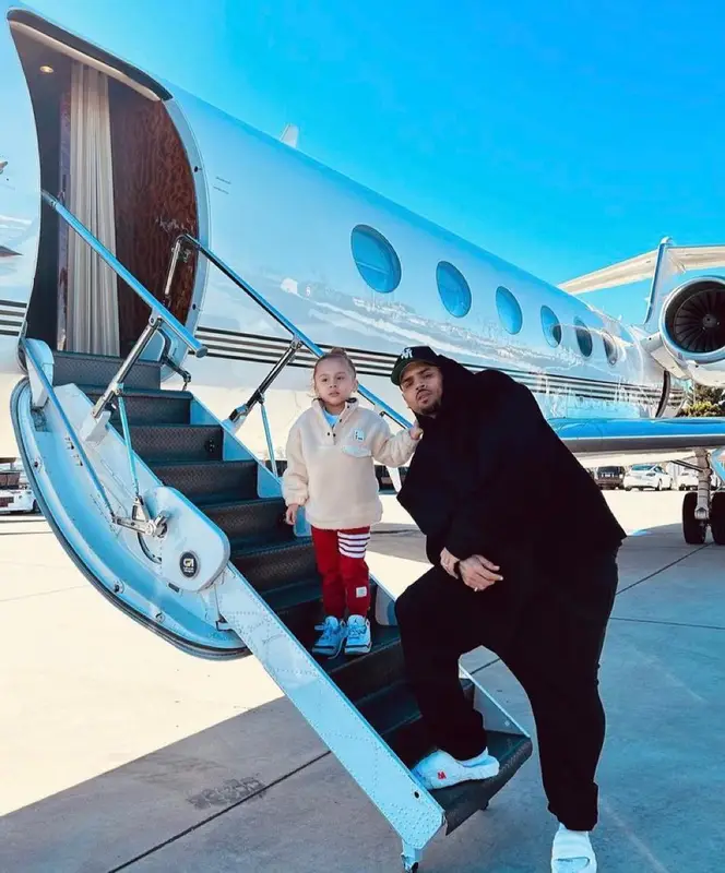 Chris Brown outfit in The Auracles, 2023