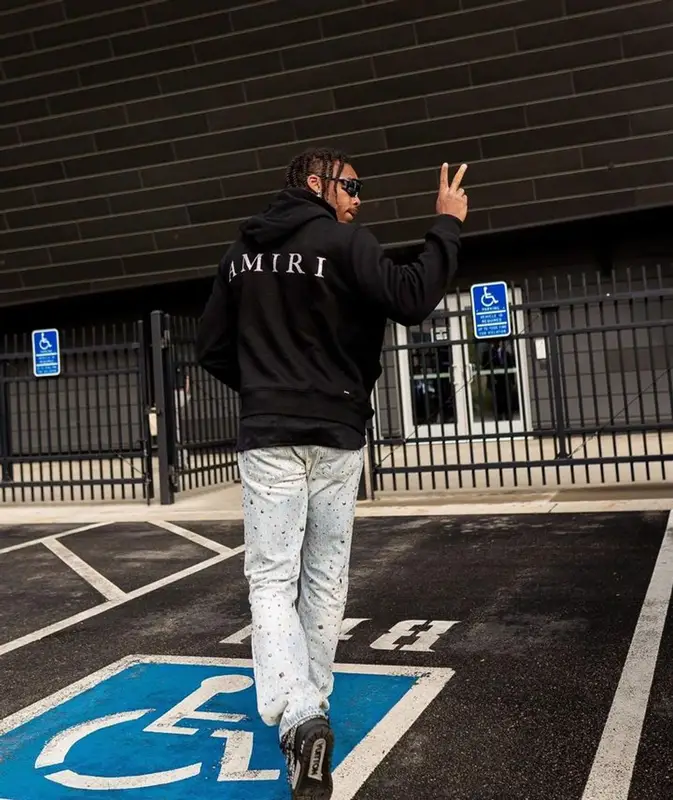 Justin Jefferson outfit in Amiri, Vetements, and Oakley, 2023