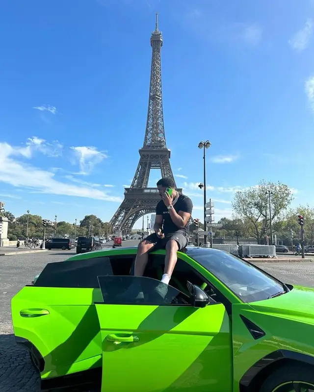 Tion Wayne outfit in Givenchy, Stone Island, and Nike, 2023
