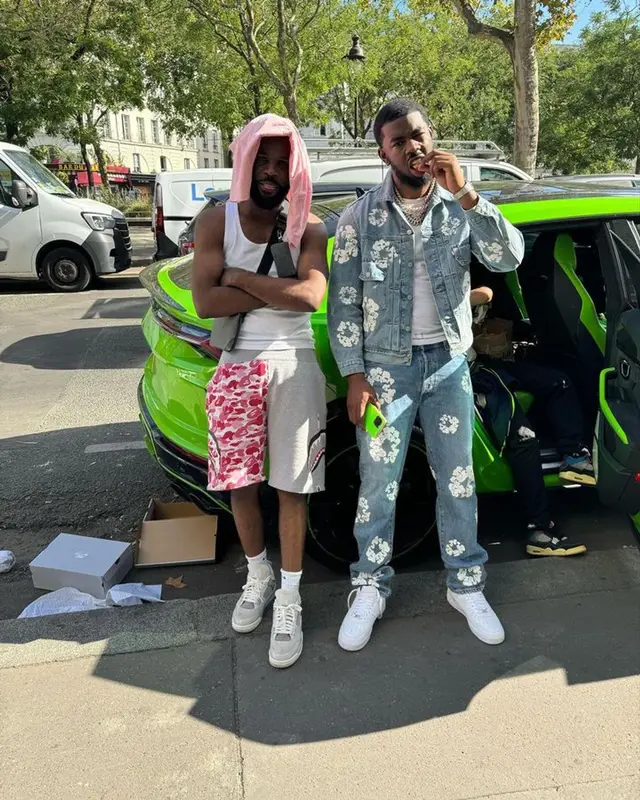 Tion Wayne outfit in Levi’s, Nike, and Denim Tears, 2023