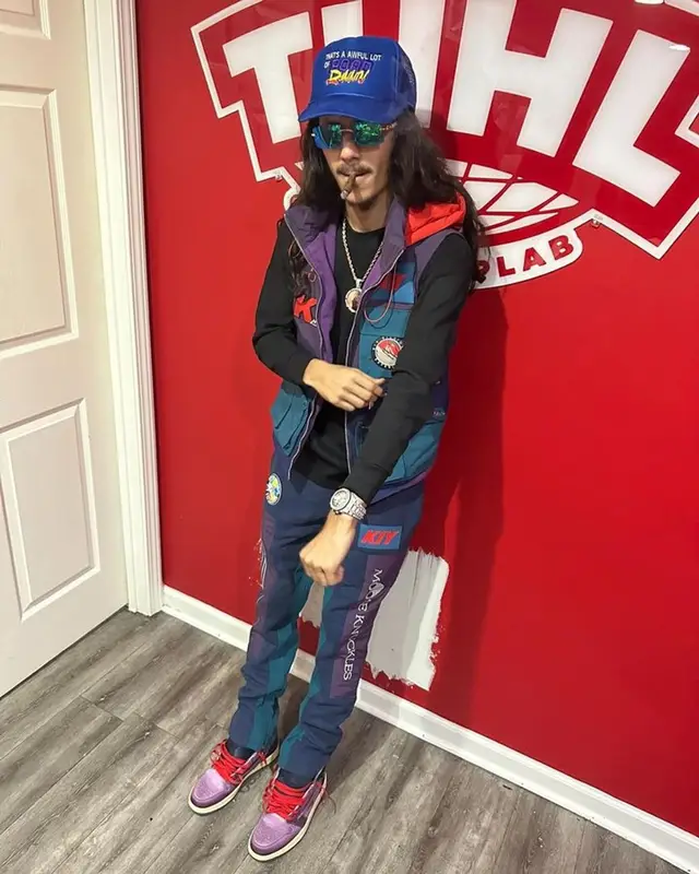 BabyTron outfit in Moose Knuckles, Roadrunners World Global, and Kool Kiy, 2023