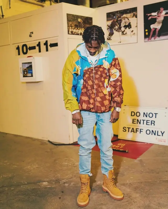 Lil Tjay outfit in Louis Vuitton and Amiri, 2023