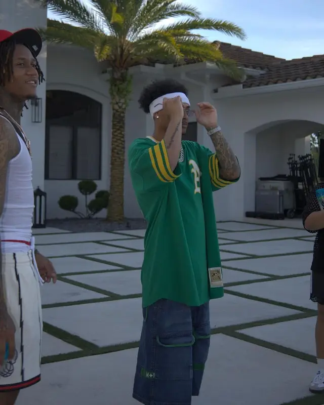 Luh Kel outfit in Mitchell & Ness, Marithe + Francois Girbaud, and Nike, 2023