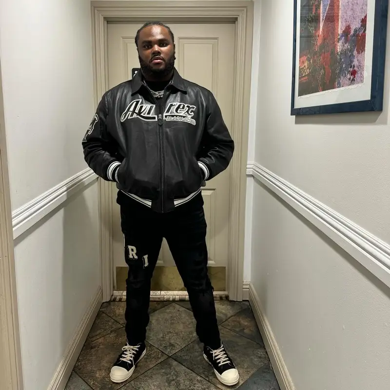 Tee Grizzley outfit in Avirex, Amiri, and Rick Owens, 2023