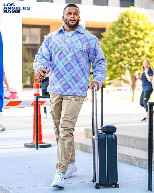 Aaron Donald outfit in Dior, Bottega Veneta, and ERL, 2023