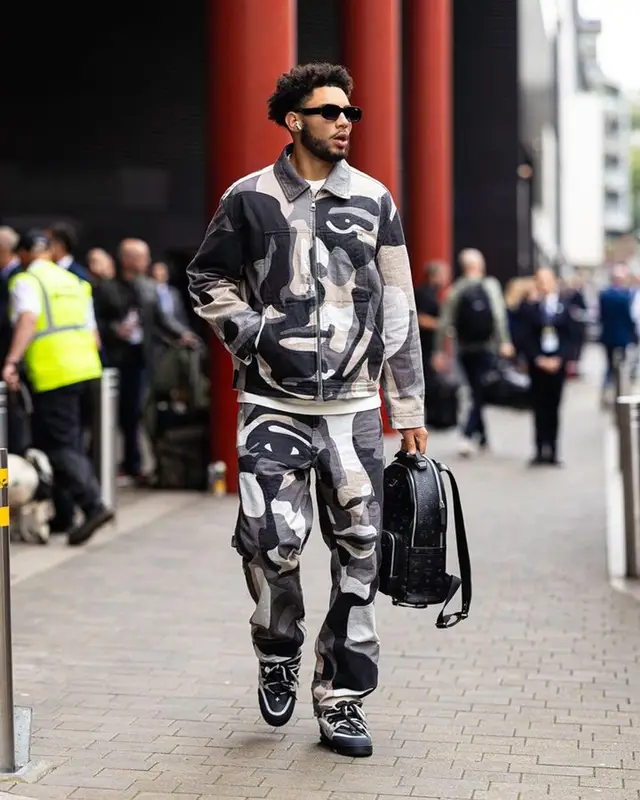 Drake London outfit in Louis Vuitton and MCM, 2023