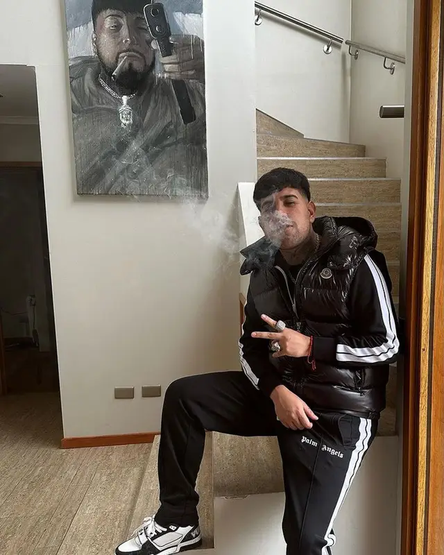 Julianno Sosa outfit in Moncler, Louis Vuitton, and Palm Angels, 2023