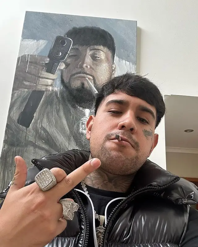 Julianno Sosa outfit in Moncler, Louis Vuitton, and Palm Angels, 2023