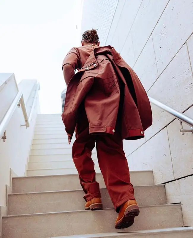 Lewis Hamilton outfit in Tommy Hilfiger, Timberland, and Gentle Monster, 2023