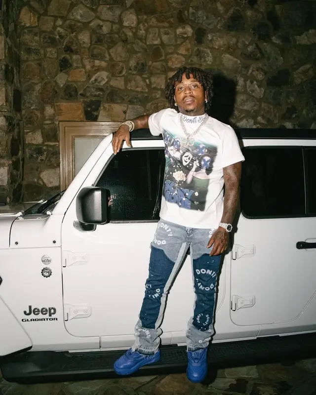 Jacquees outfit in Dont'i, Versace, and Cartier, 2023