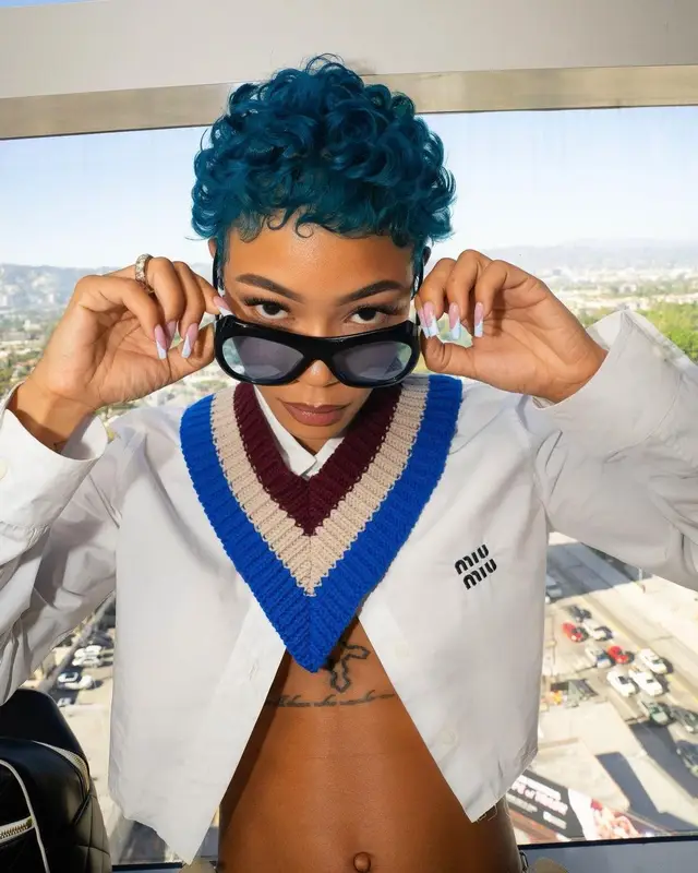 Coi Leray outfit in Miu Miu, Chanel, and Port Tanger, 2023