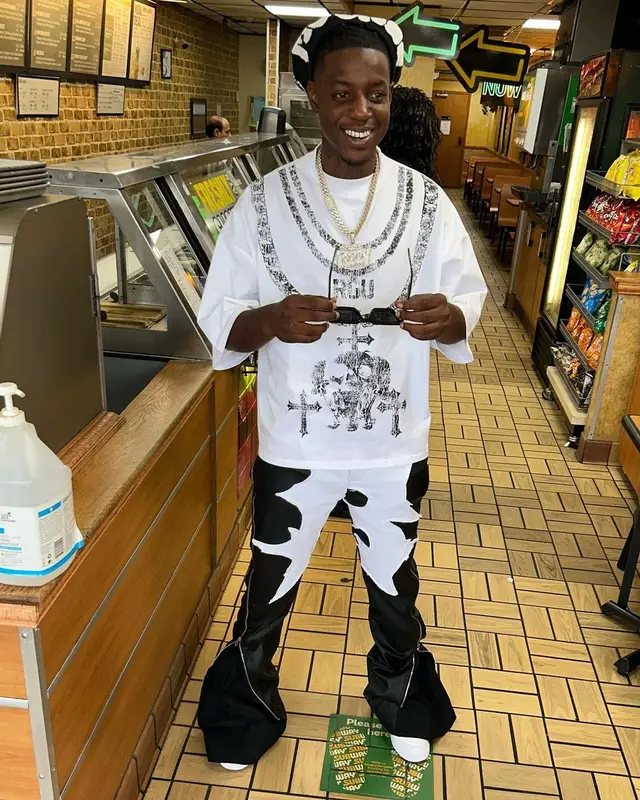 OMB Peezy outfit in Ricco Gioventu, Billionaire Studios, and Nike, 2023