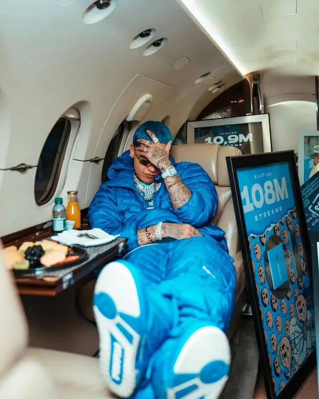 Blessd outfit in Supreme, Louis Vuitton, and Oakley, 2023