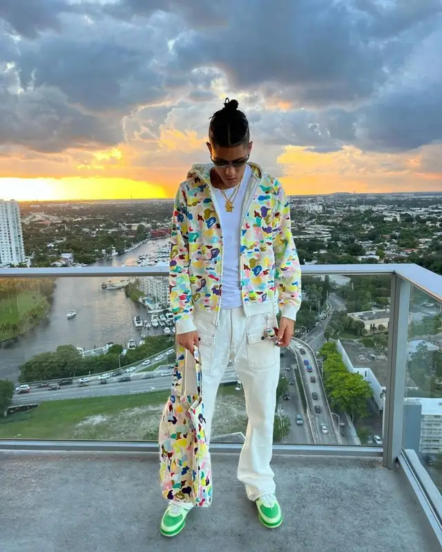 Spence Lee outfit in Bape and Cartier, 2023